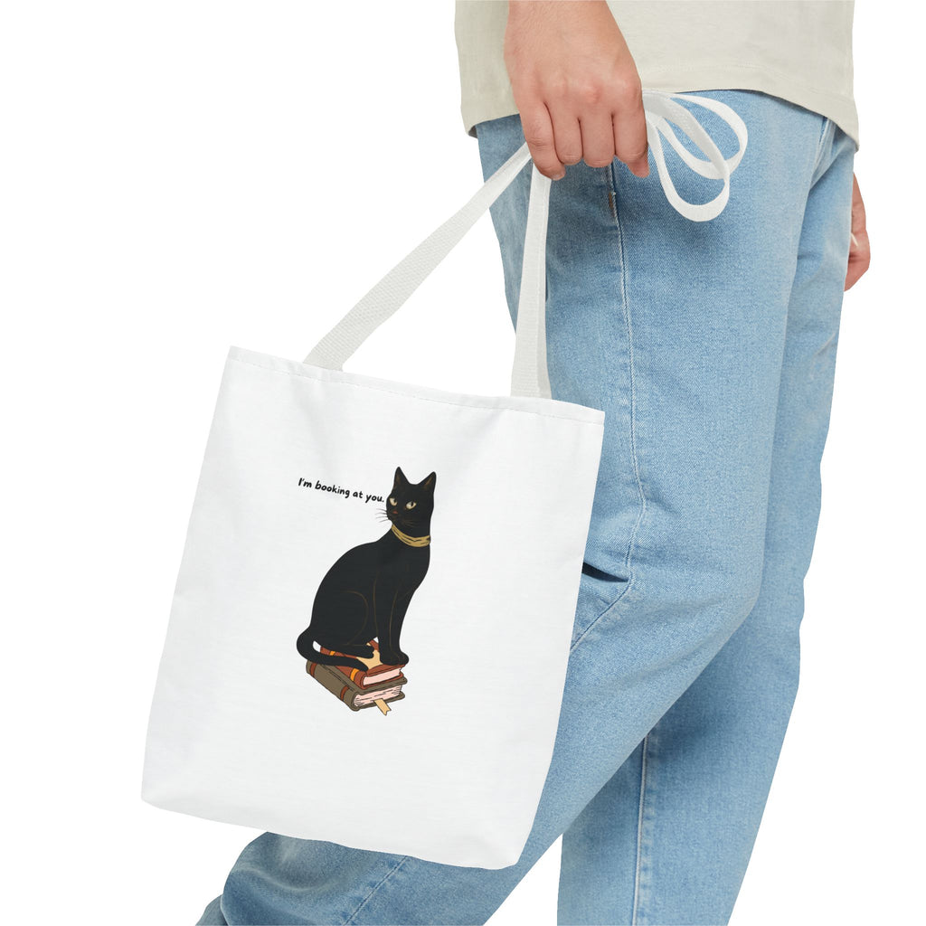 Black Cat on Books Tote Bag — “I’m Booking at You” Cute Literary Cat Library Tote