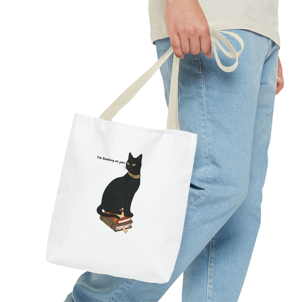 Black Cat on Books Tote Bag — “I’m Booking at You” Cute Literary Cat Library Tote